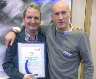 Frank Crummey receiving CDYSB award